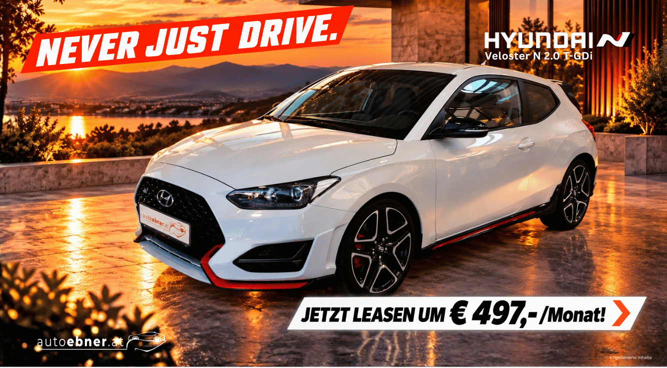Foto: Hyundai Veloster N weiß, schräge Frontalansicht, Hintergrund Haus