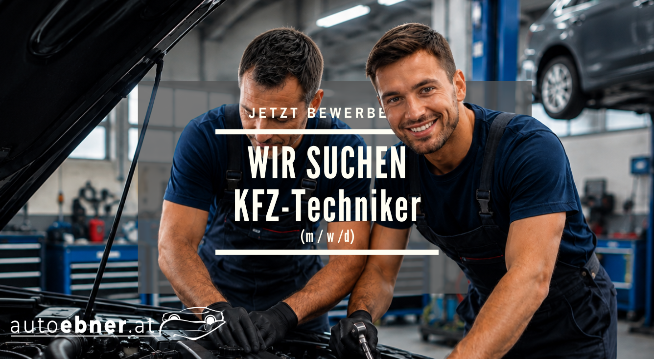 KFZ-Techniker arbeitet im Motorraum, Werkstatt.